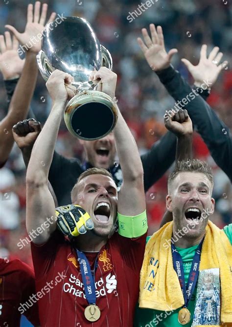 Liverpools Team Captain Jordan Henderson Lifts Editorial Stock Photo ...