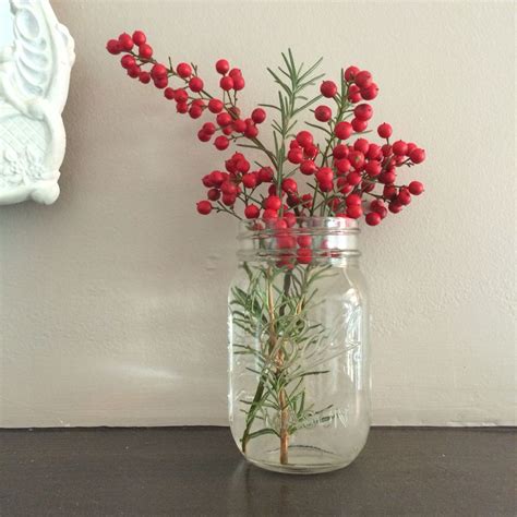 Nandina Berries And Rosemary Sprigs From The Garden For Holiday