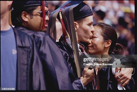 Kissing Graduation Photos And Premium High Res Pictures Getty Images