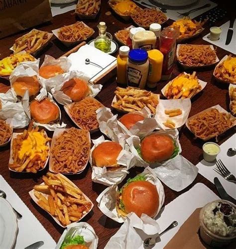 A Table Filled With Lots Of Different Types Of Food