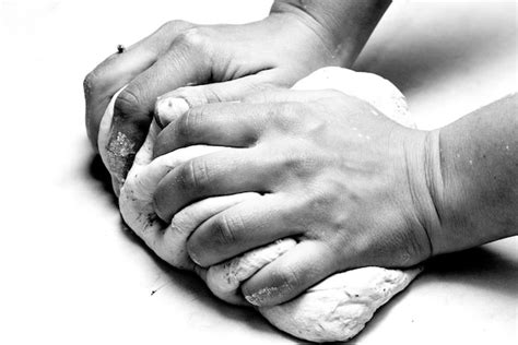 Premium Photo Cropped Hands Of Woman Kneading Dough On Table