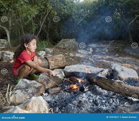 Young girl campfire stock image. Image of leisure, adventure - 15413611