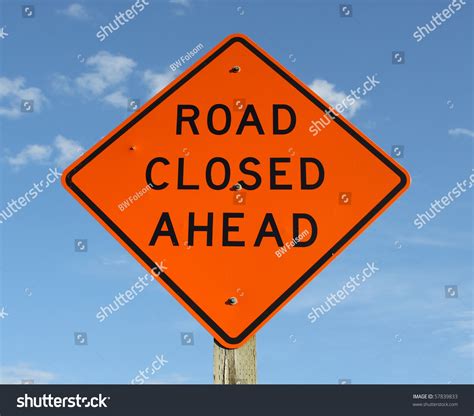 Bright Orange Warning Sign Stating Road Stock Photo 57839833 - Shutterstock