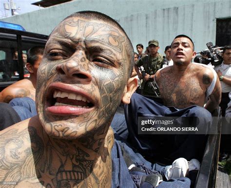 Members of the gang "Mara 18" are transported in a van after their... News Photo - Getty Images