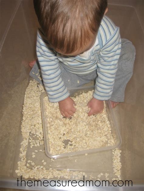 A Baby Sensory Play Activity Baby In The Oats The Measured Mom