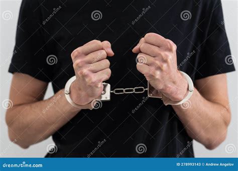 Arrested Man With Cuffed Hands Behind Prison Bars Stock Image Image