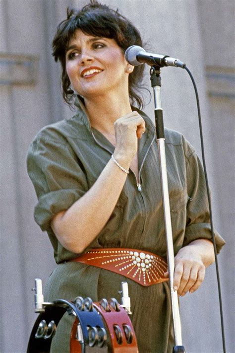 Download Iconic Performer Linda Ronstadt in Action Wallpaper ...