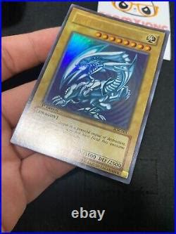 YuGiOh SDK 001 1st Edition Ultra Rare Blue Eyes White Dragon ASIAN