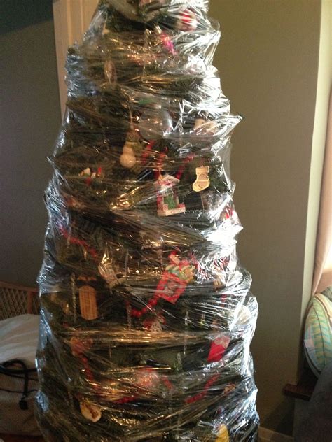 Easiest And Quickest Way To Store A Christmas Tree Saran Wrap It Ornaments And All Then Th