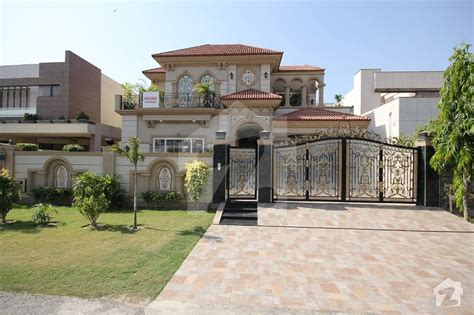 One Kanal Brand New Faisal Rasool Out Standing Spanish Bungalow Near To