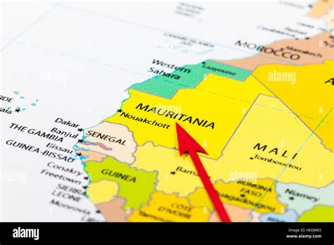 Red Arrow Pointing Mauritania On The Map Of Africa Continent Stock