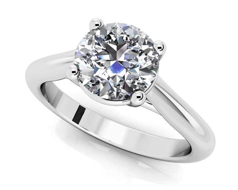 Round Brilliant Cut Diamond Solitaire Ring In Gold Or Platinum