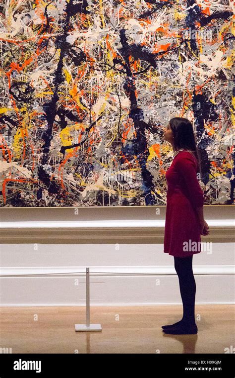 A Woman Looks At Blue Poles 1952 By Jackson Pollock During A