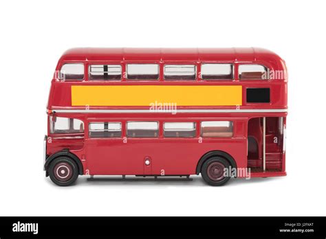 miniature scale model of a vintage red london bus on white Stock Photo ...