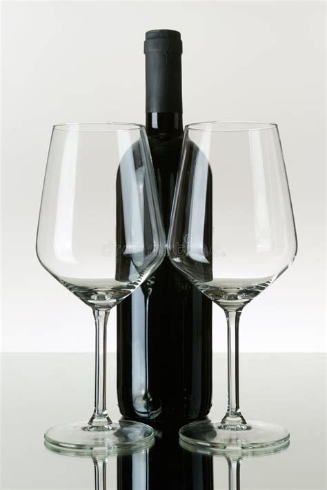 Two Empty Wineglasses And A Bottle Of Red Wine Stock Image Image Of