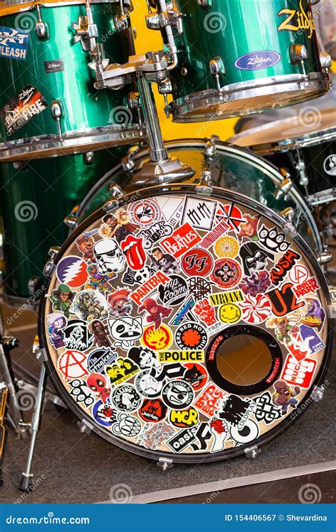 Drums with stickers editorial photography. Image of hair - 154406567