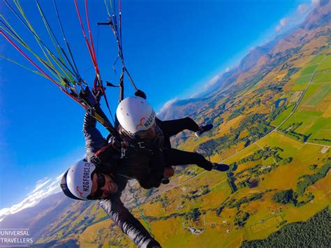 SOARING THROUGH THE SKY PARAGLIDING IN QUEENSTOWN NEW ZEALAND