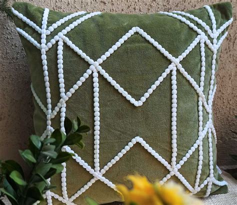 Buy Sage Green Pom Pom Embroidered Velvet Cushion Cover Set Of X