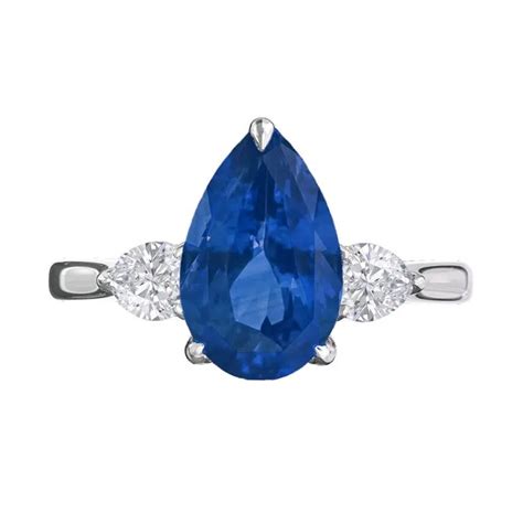 Pear Shaped Blue Sapphire Three Stone Engagement Ring