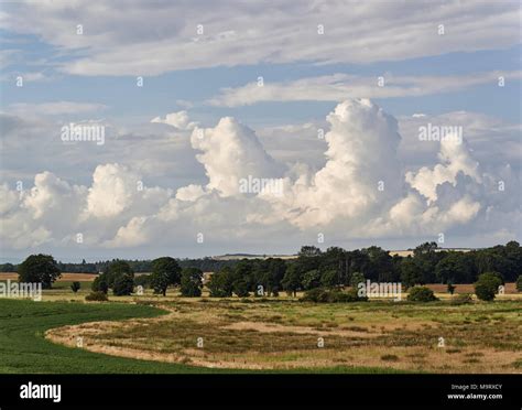 Cumulonimbus Clouds Beginning To Form Over The Angus Countryside At