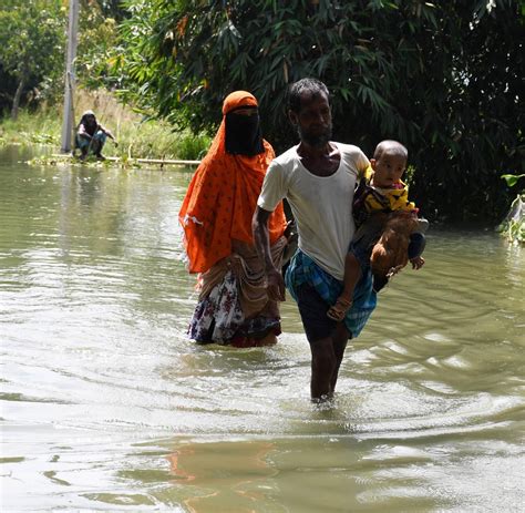 Assam Flood Situation Improves Marginally 493 Lakh Affected In Pics