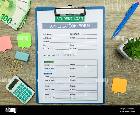 Student loan application form document on table Stock Photo - Alamy