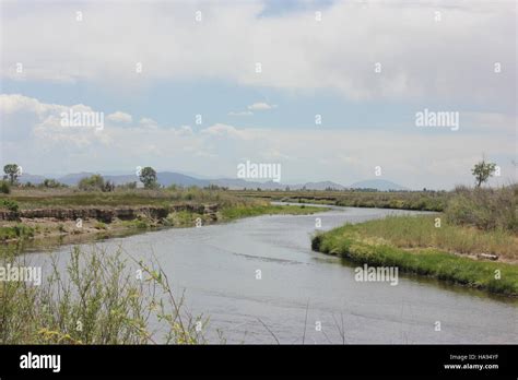 The Rio Grande River Flows Through The Alamosa National Wildlife Refuge