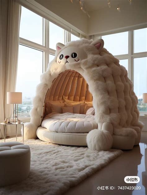 A Bed Made To Look Like A Cat In A Room With Large Windows And White Rugs