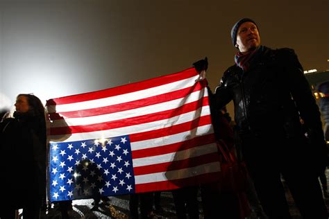 What is the significance of the American flag hung upside down?