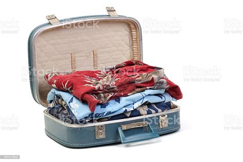 Blue Suitcase Full Of Clothes Stock Photo Download Image Now Open