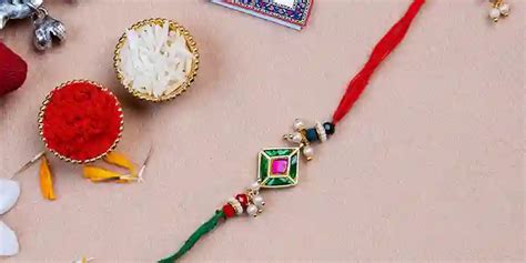 Rajtilak Rangoli Silver Rakhi With Haldirams Gulab Jamun Rakhi