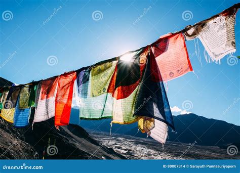 Colorful Prayer Flags With Sun Shining Through One Of Prayer Flags In