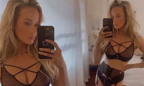 Simone Holtznagel Pours Her Voluptuous Figure Into Sheer Black Lingerie