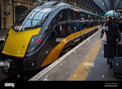 Grand Central Train at Kings Cross Station London. Grand Central Train ...