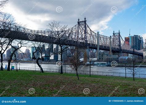 Queensbridge Park Along The East River With The Queensboro Bridge In