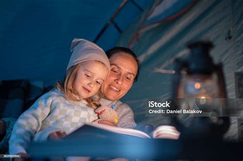 Family Camping At Lake Bedtime Story With Mom In Tent Copy Space Stock Photo - Download Image ...