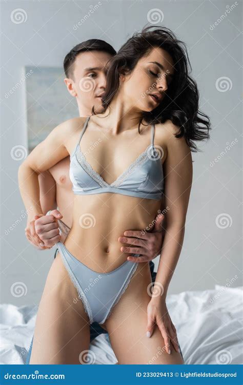 Man Touching Panties Of Girlfriend Stock Image Image Of Attractive Together 233029413