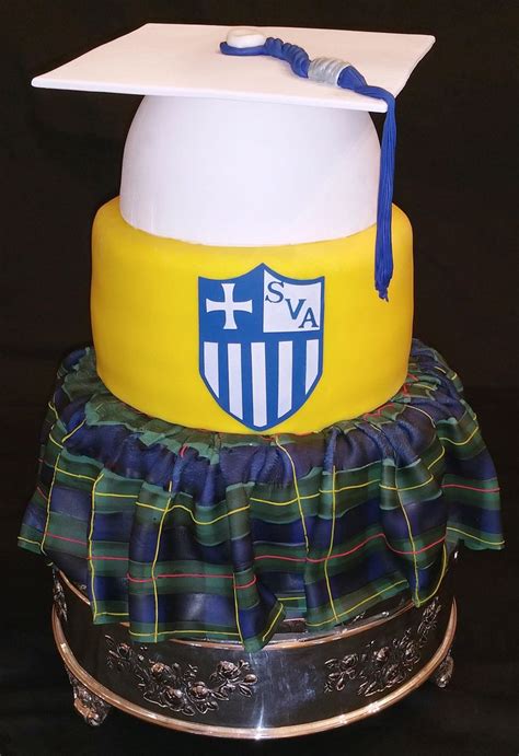 A Tier Graduation Cake Made By Coastal Confections Bakery Located In