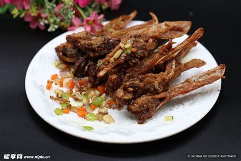 椒盐鸭下巴摄影图传统美食餐饮美食摄影图库昵图网