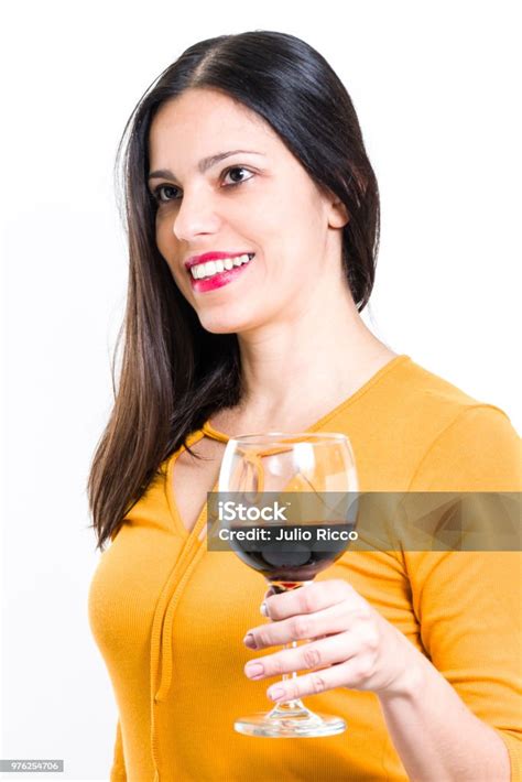 Beautiful Woman Holding Glass Of Wine Looking Aside White Background