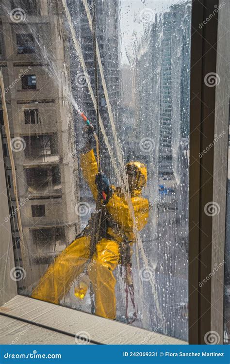 Skyscraper Window Cleaner Washing A Window In Doha Qatar Stock Image