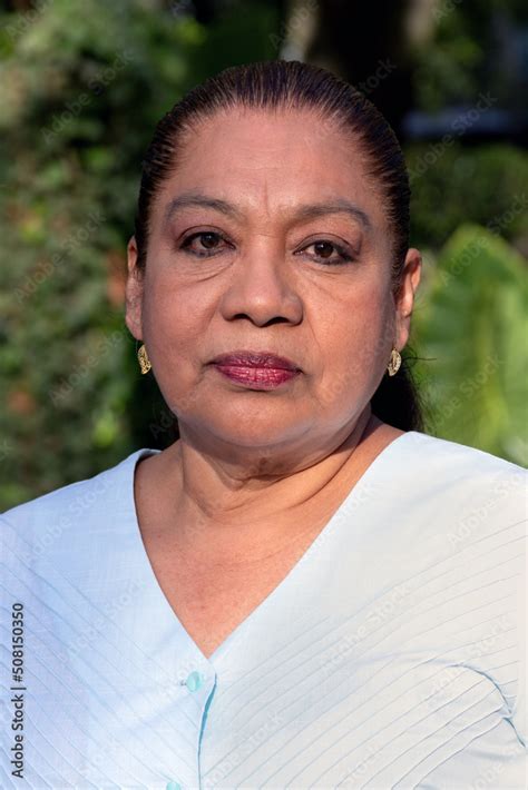 Mature Mexican Lady Looking At The Camera Mature Latina Woman Looking At The Camera Serious