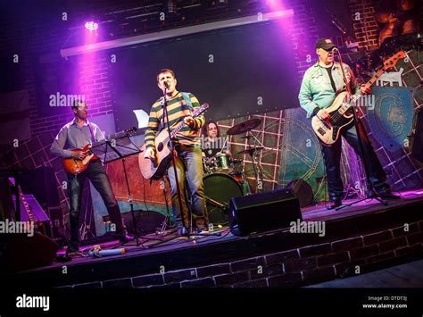 Band performs on stage, rock music concert Stock Photo - Alamy