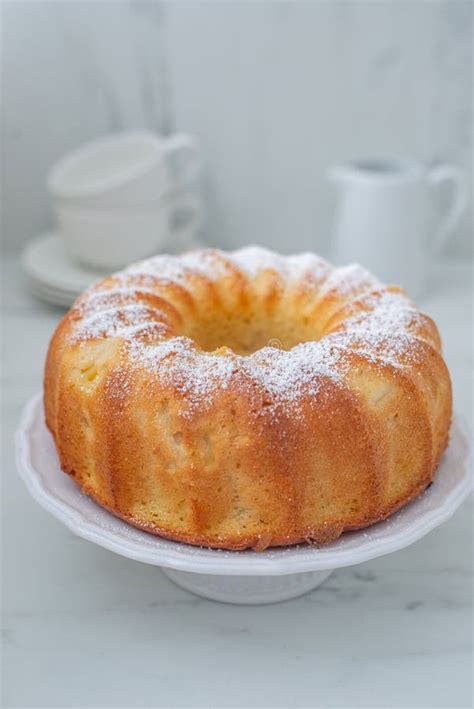 Lemon Bundt Cake Drizzled with Powdered Sugar Glaze Stock Photo - Image ...