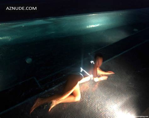 Kourtney Kardashian Sexy Shows Off Her Curves In A Glowing Bikini Aznude