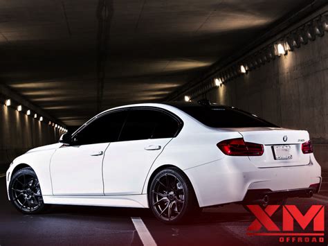 The Timeless Luxurious Look of a White Car with Black Rims