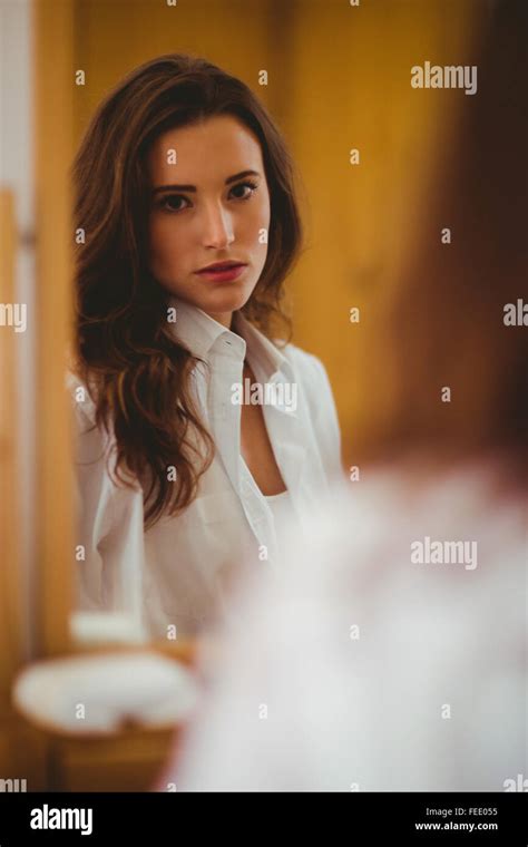 Beautiful Brunette Posing In Front Of The Mirror Stock Photo Alamy