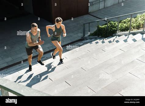 Sportive Couple During Workout Stair Running Outdoors Stock Photo Alamy