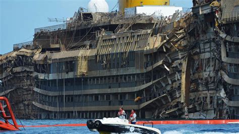 Shipwrecked Costa Concordia Cruise Ship Pulled Upright Off Italian