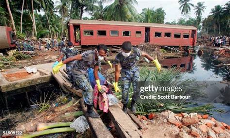 Tsunami Rescue And Relief Effort Continues Photos and Premium High Res ...